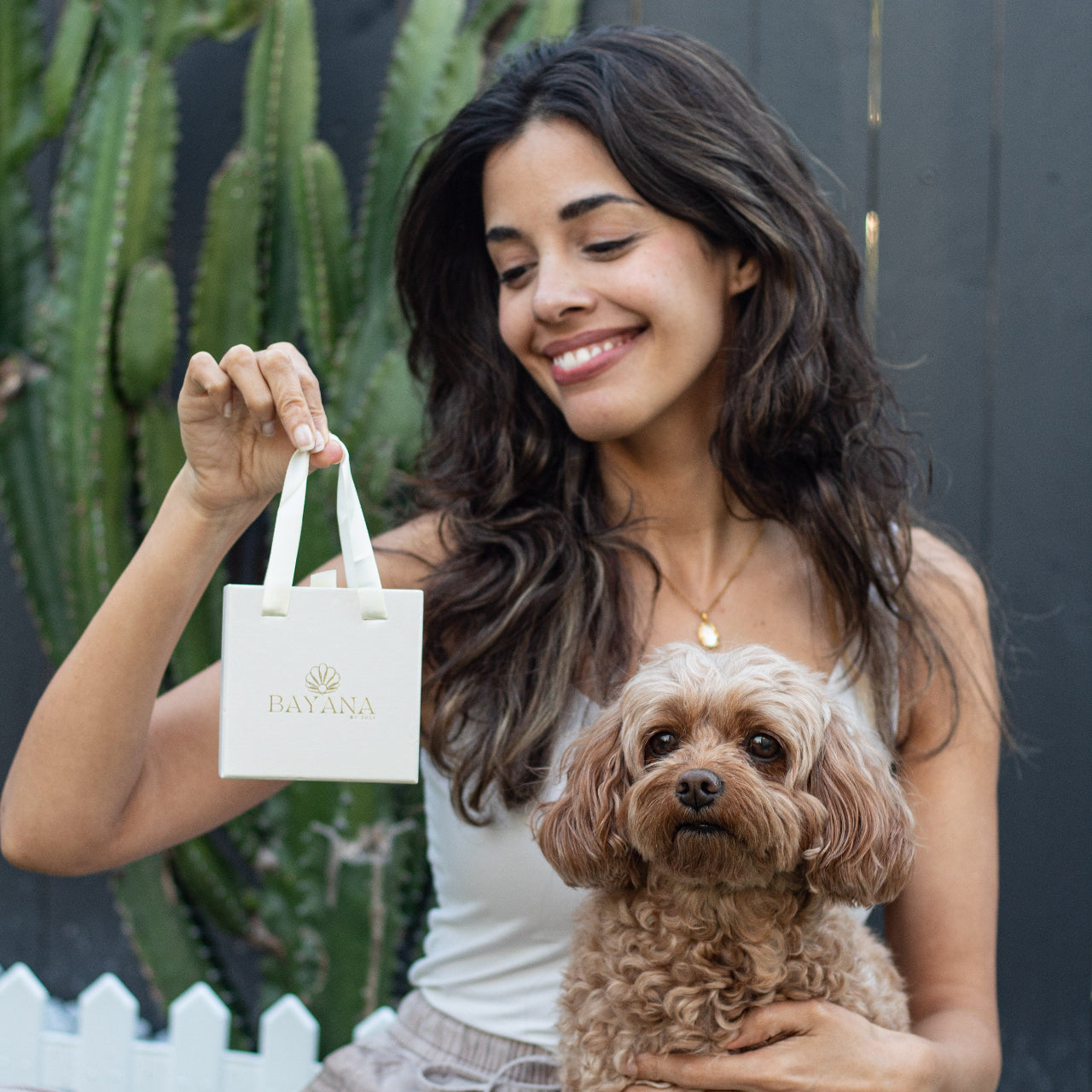 A premium gift box designed to present and protect your Bayana jewellery. Elegant, durable, and planet-conscious, it’s the perfect way to elevate your unboxing experience while keeping your pieces safe.

Dimensions: 10×10×3.5 cm (ideal for necklaces, earrings, rings & bracelets)
Luxury detail: Embellished with the Bayana logo in radiant gold
Protection: Keeps jewellery secure and minimises scratches or tangles
Eco-friendly: Made with recyclable, planet-minded materials
Reusable: Perfect for both gifting and