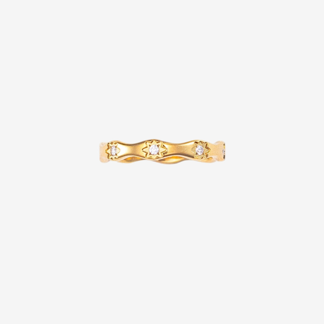 Gold ring with small diamonds on a white background