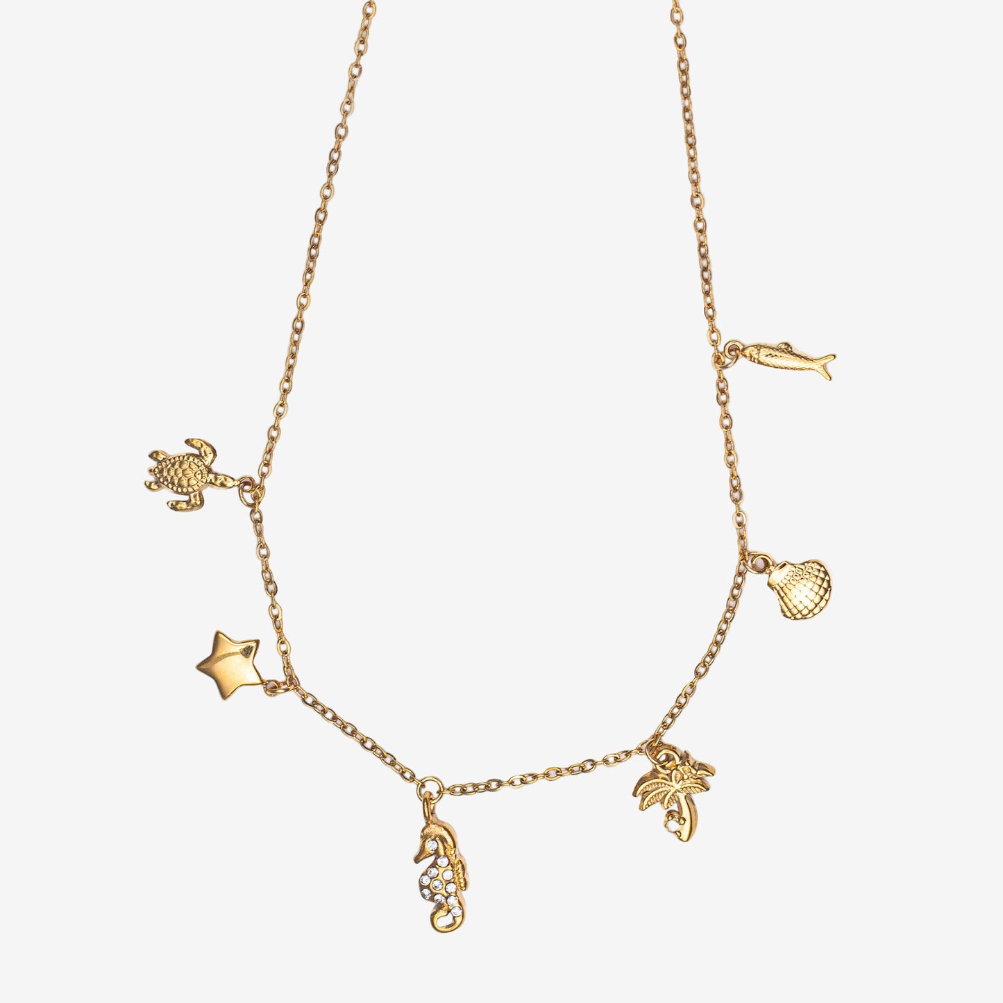 OCEAN CHARMS NECKLACE - 18k Stainless Steel. Turtle Starfish seahore palm tree shell and fish charms Minimalistic