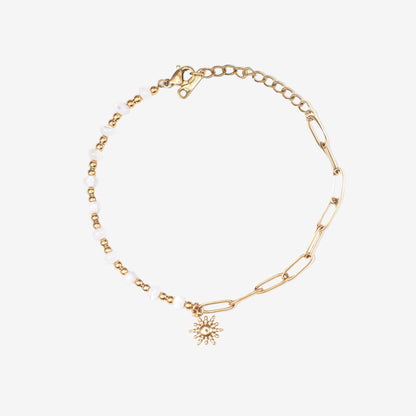 Gold bracelet with a sunflower charm on a white background. Stainless steel waterproof sheel beads, Stainless steel 18k PVD Gold Plated. Waterproof jewellery. Australian jewellery. ocean inspired jewellery.