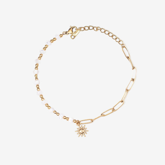 Gold bracelet with a sunflower charm on a white background. Stainless steel waterproof sheel beads, Stainless steel 18k PVD Gold Plated. Waterproof jewellery. Australian jewellery. ocean inspired jewellery.
